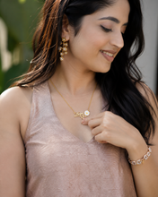 The Scripted Daisy Pendant: The Art of Personal Identity