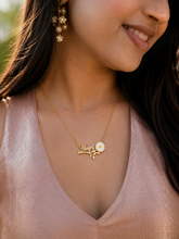 The Scripted Daisy Pendant: The Art of Personal Identity